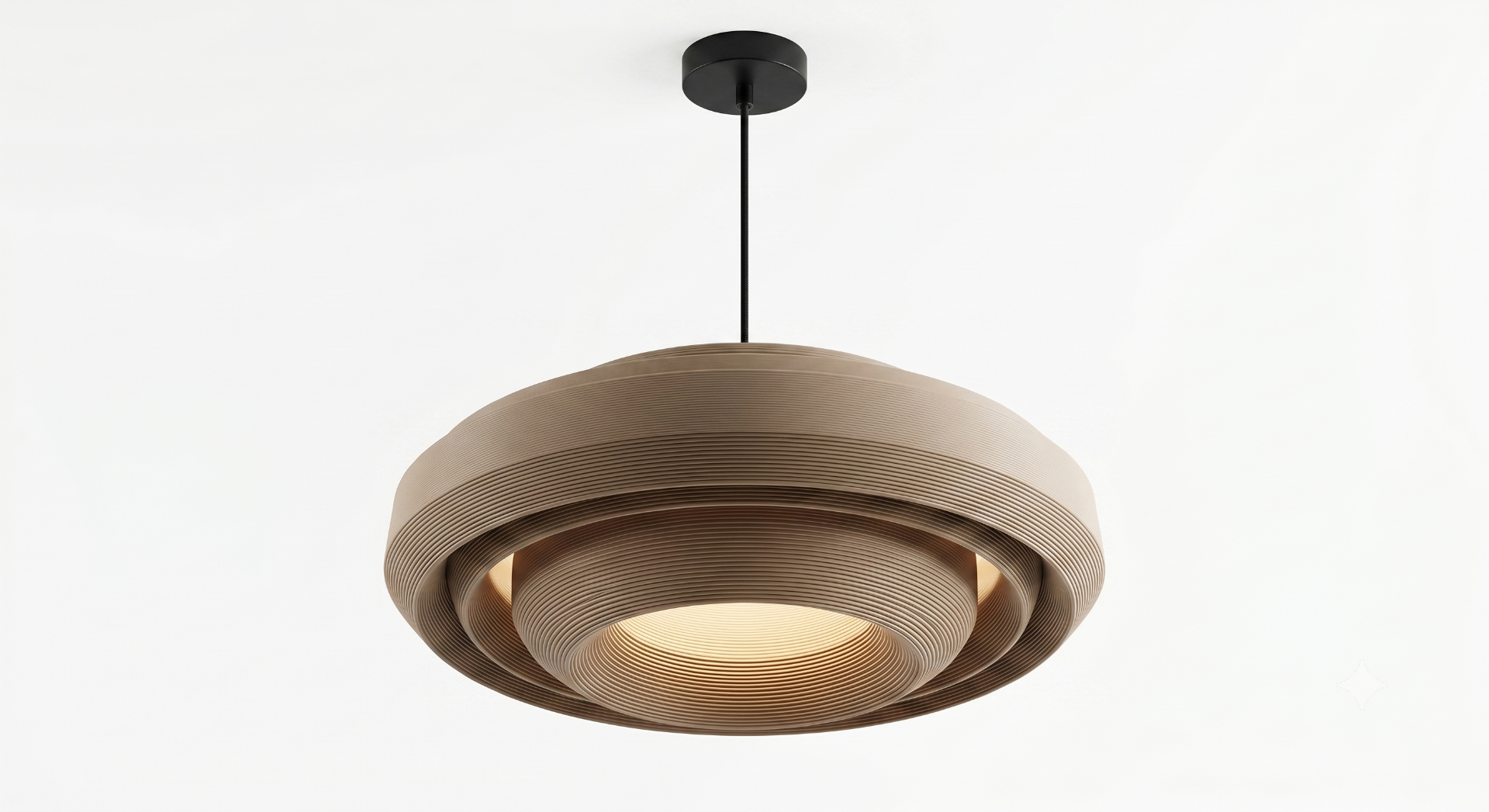 Pendant lamp shade with a perforated geometric pattern
